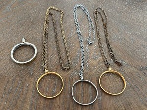 lot 25 image: Possible Coin Holder Necklaces