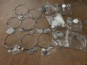 lot 42 image: Bangle Bracelets with Charms
