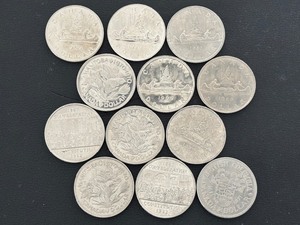 lot 29 image: Canadian Dollar Coins