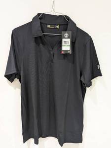 lot 31 image: NEW UNDER ARMOUR WOMANS LARGE GOLF POLO (BLACK)