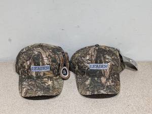 lot 86 image: (2) REALTREE CAMOUFLAGE HATS (LEADER)