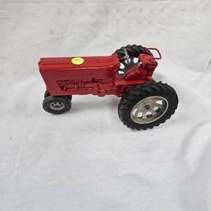 lot 4 image: Hubley N.F. Farmall Tractor-Repainted