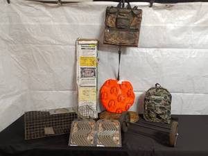 lot 29 image: Hunting and Outdoor Gear Set with Bags, Game Carrier, Steps, and More