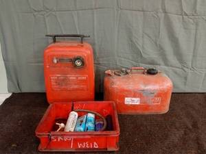 lot 54 image: Vintage Boat Gas Cans and Red Tray with Grease Tubes