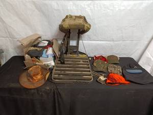 lot 115 image: Alum-i-Lok Model AL-100 Tree Stand and Assorted Hats Collection