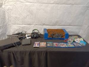 lot 160 image: Gaming  Lot with Controllers, DVDs, and Blu-rays