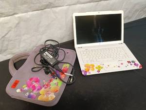 lot 163 image: Used HP Laptop with Floral Design and Charger