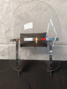 lot 164 image: Harley Davidson Clear Motorcycle Windshield with Chrome Hardware and windshield bag