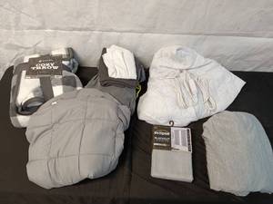 lot 187 image: Assorted Bedding with Blanket, Weighted Blanket, and Blackout Curtain