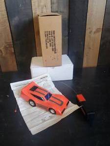lot 13 image: Vintage Radio Control Donut Wheelie Power Command in Box