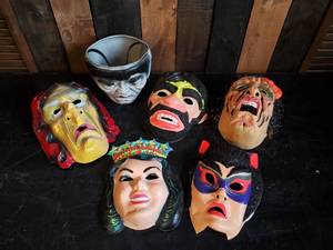 lot 33 image: Vintage Halloween Masks and Candy basket