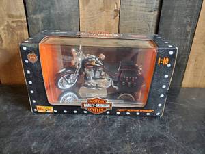 lot 44 image: Heritage Springer Harley Davidson Bike Still in Box
