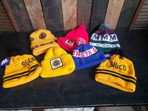 lot 56 image: Lot of Various Collectible Ag Vintage Winter caps Sigco, Champlin and more most never worn