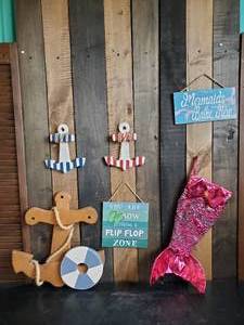lot 85 image: Lake Dcor Lot With Mermaid Stocking, Mermaids Bathe Here, Flip Flop Zone and more