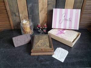 lot 88 image: Vintage Lot of Amish  Cast iron figurines, Vintage Picture Frame Vanity Box, Still in Box Serenity Table cloth and more