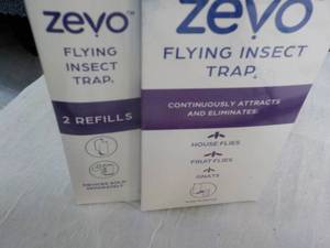 lot 61 image: Zevo Flying Insect Trap and Refills...