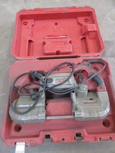 lot 131 image: MILWAUKEE, ELECTRIC BAND SAW WITH CASE FOR PARTS