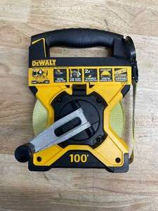 lot 28 image: DEWALT 100 ft. Fiberglass Long Tape Measure DWHT34145 (07102513.45)