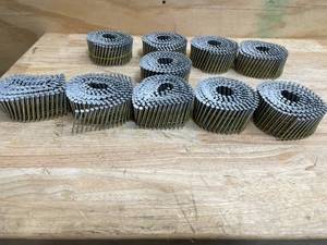lot 47 image: DEWALT 2 in. x 0.090 in. Metal Coil Ring Shank Nails (Assumed 3000 Total)