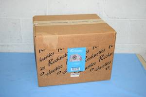 lot 41 image: New in Box Rockustics 6.5 2-Way Outdoor Weatherproof EconoRock Rock Loudspeaker (Brown)