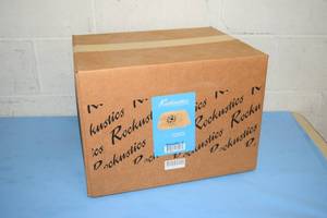 lot 42 image: New in Box Rockustics Rocquette Sandstone Color Rock-Shaped Outdoor Patio  Landscaping Pro Audio Speaker