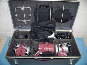 lot 69 image: (3) Mole-Richardson Studio Lights and (1) Lowel TOTA Light with Accessories in Hard-Sided Case