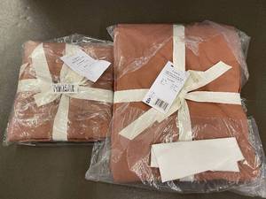 lot 18 image: Set of Twin XL Linen Bed Skirt and Euro Sham in Terracotta