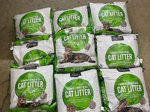 lot 31 image: Lot of 8 damaged Bags of Unscented Cat Litter, approx 130lbs total