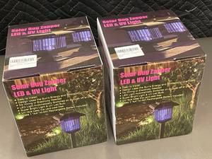 lot 38 image: Set of 2 Solar Bug Zappers with LED & UV Light