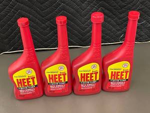 lot 56 image: Set of 4 12oz Iso-HEET Fuel Injector Cleaner and Water Remover Bottles