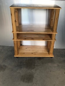 lot 6 image: Log Shelving Unit on Wheels