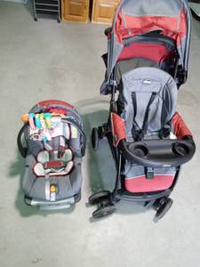 lot 28 image: Chicco brand Baby stroller with interchangeable infant car seat