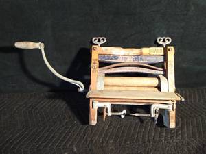 lot 44 image: 1899 Wood clothes wringer