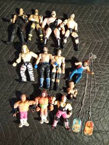 lot 65 image: 12 Wrestler figurines and 2 wrestler necklaces