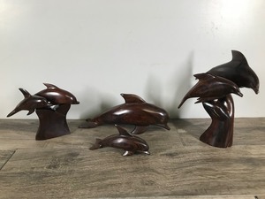 lot 254 image: Lot of 4 Hand Carved Ironwood Dolphin Figurines