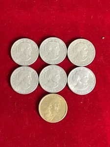 lot 298 image: Lot of 7 One Dollar Coins - 6 Susan B Anthony and 1 Sacajawea