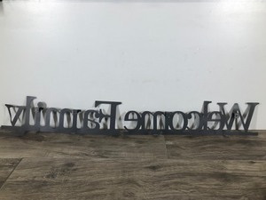 lot 323 image: 2 Piece Wall Hanging Metal Signs - Family Welcome