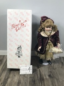 lot 326 image: Delton Products Corporation Large Porcelain Doll in the Box with Certificate of Authenticity