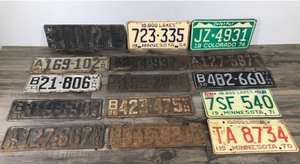 lot 362 image: Lot of 15 Collectible License Plates - Dates range from 1918 - 1974
