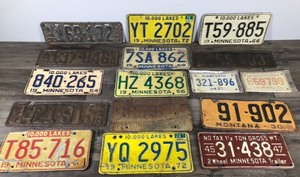 lot 363 image: Lot of 16 Collectible License Plates  - Dates range from 1929 - 1972