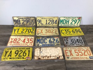 lot 365 image: Lot of 12 Collectible License Plates  - Dates range from 1954 - 1974