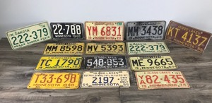 lot 366 image: Lot of 14 Collectible License Plates  - Dates Ranging from 1948 to 1974