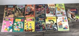 lot 371 image: Lot of 13 Collectible Gold Key Comic Books - 12 centers to 35 centers  - Turok - Brothers of the Spear - The Twilight Zone - Uncle Scrooge - Tarzan of the Apes - Walt Disneys Comics & Stories - Ripleys Believe it or Not - Hanna Barbera Top Cat