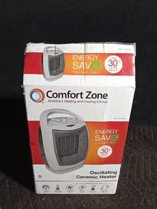 lot 120 image: Oscillating energy saver Ceramic Heater new in box