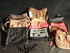lot 107 image: Purses - some new and others like new