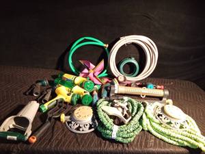 lot 110 image: Sprinklers, nozzles. garden tools, water timers and garden hoses