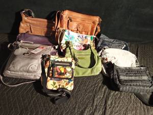 lot 103 image: Purses - some new and others like new