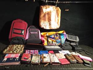 lot 104 image: Wallets, tote bags, tablet cases, and more
