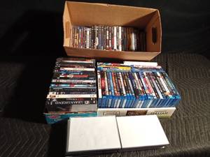 lot 105 image: Lot of DVDs and a few empty cases