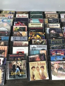 lot 407 image: Lot of Music CDs and More - Neil Diamond - Rascal Flats - Dixie Chicks - Elton John - Nelly Furtado and More